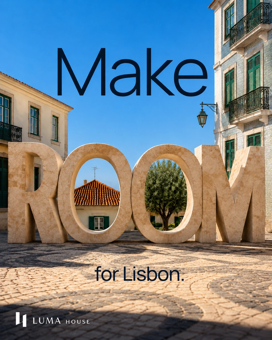 Monumental limestone letters spelling ROOM stand in a Lisbon square beneath Make and above for Lisbon.